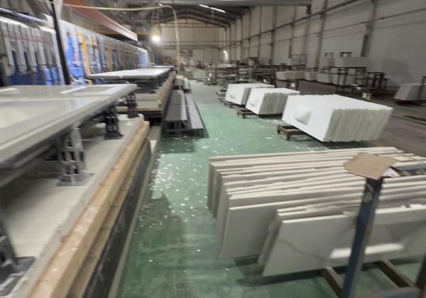 Formed basins leaving the kiln on the conveyor line
