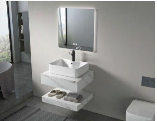 Vessel basin standing on a sintered stone top
