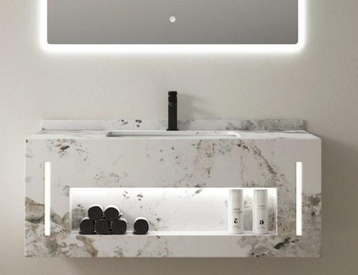 Ceramic bowl set flush into a veined sintered stone top